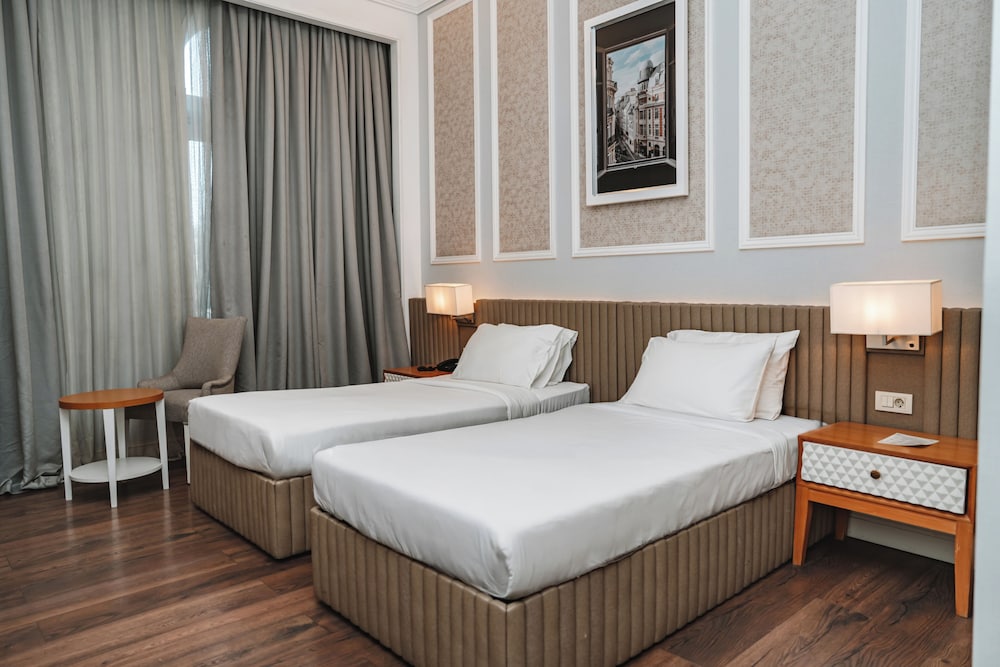 غرفة ديلوكس بسريرين منفصلين بغرفة نوم واحدة، Promenade Hotel 2/8