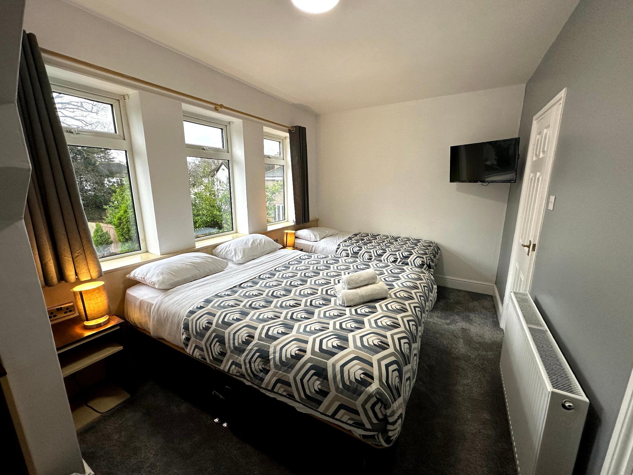 غرفة ثلاثية بسرير مزدوج وسرير فردي بحمام خاص، Gainsborough Lodge 2/2