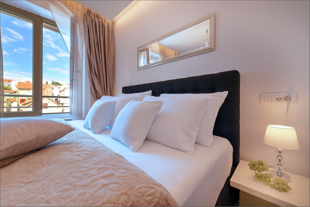Via Porto Rooms 27/49
