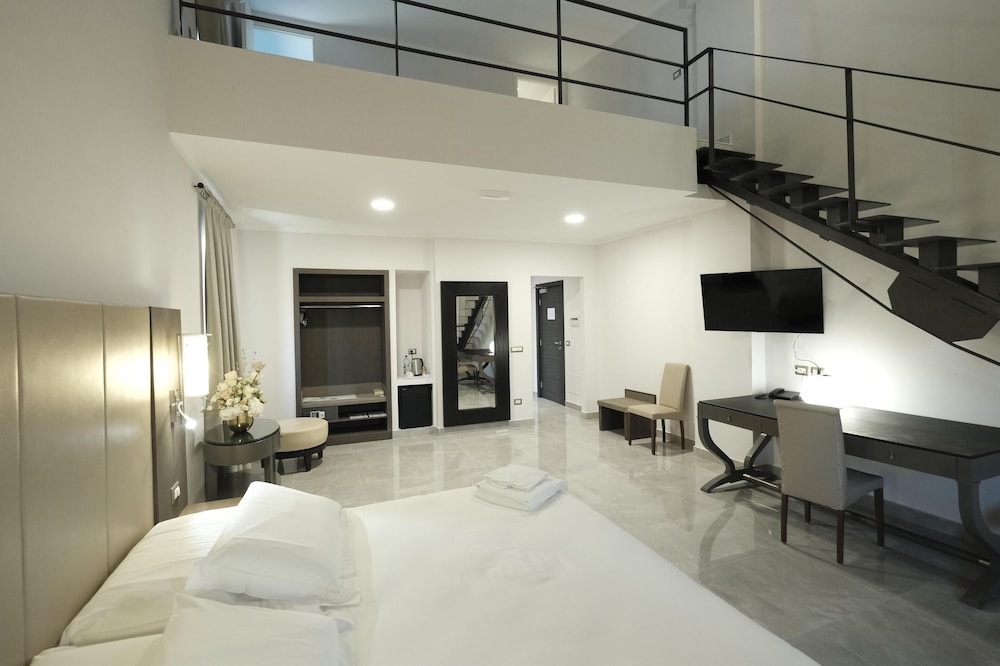 غرفة عائلية بسرير كينج وثلاثة أسرّة، Best Western Grand Hotel Catanzaro 5/5