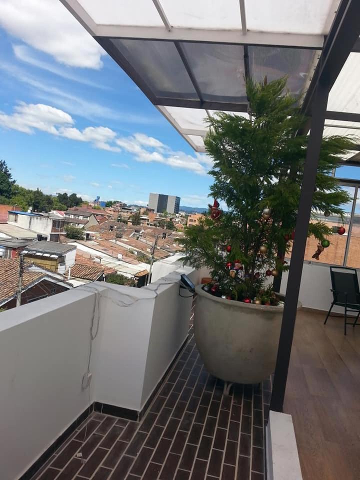 A Bogota On Holidays by Open 5/20