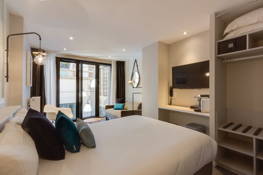 جناح جونيور بسرير كينج مع أريكة، Hotel Les 2 Villas 3/10