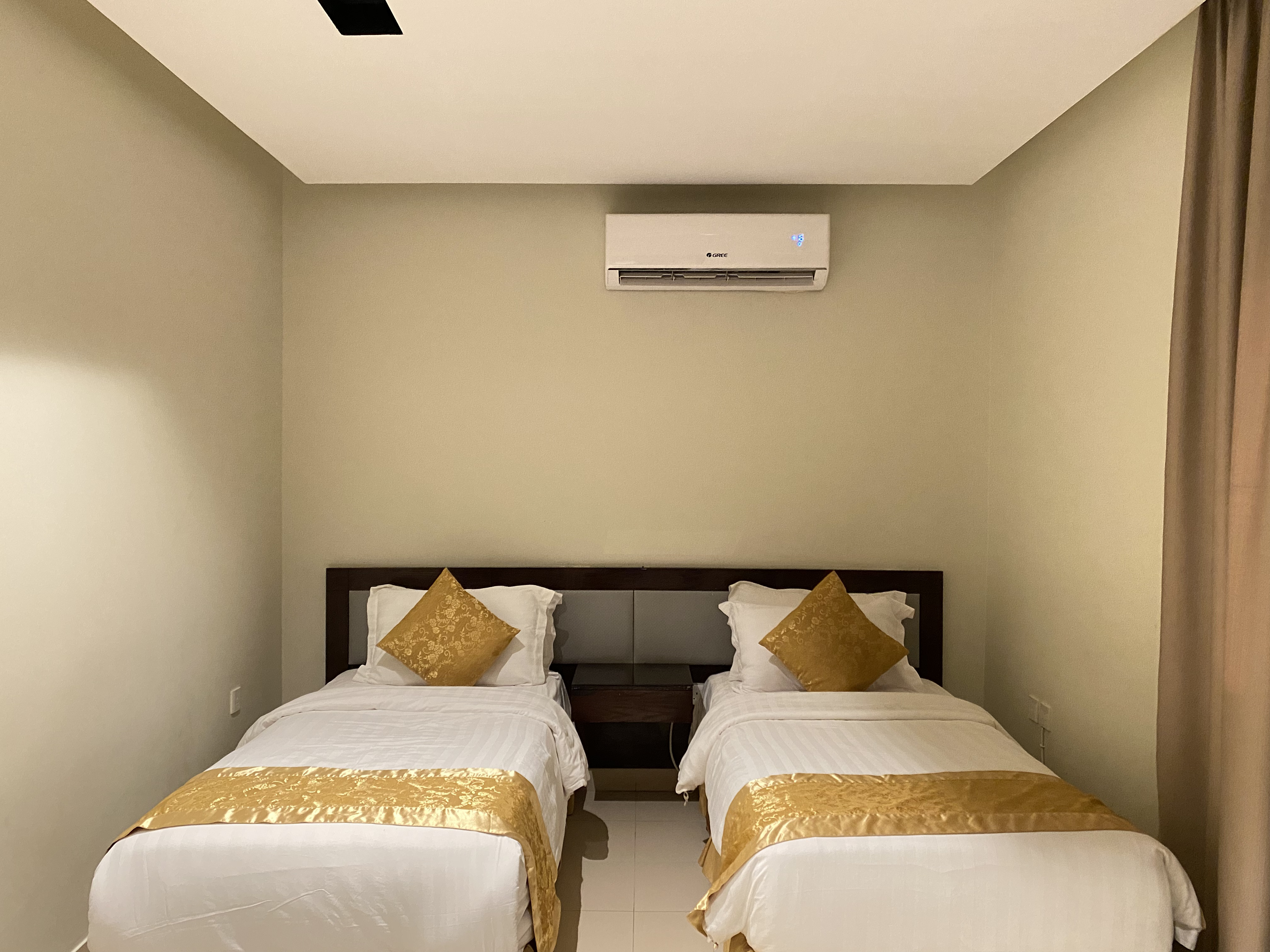Room at Triple Tree Hotel, AL AHSA