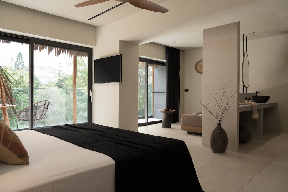 جناح بسرير كوين مع أريكة، The Syntopia Hotel 3/4