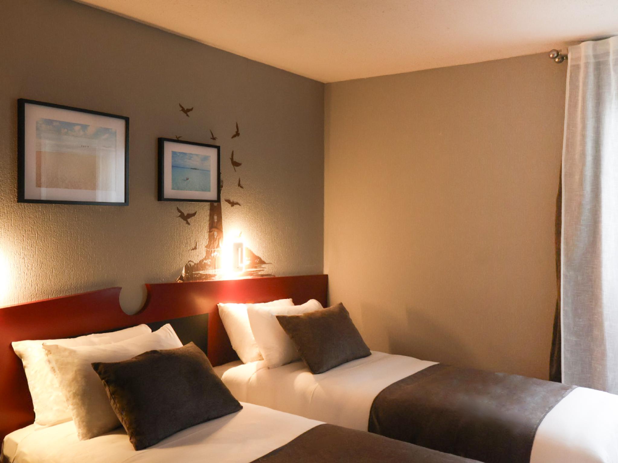 Hotel Rinascitel Larmor Plage 4/8