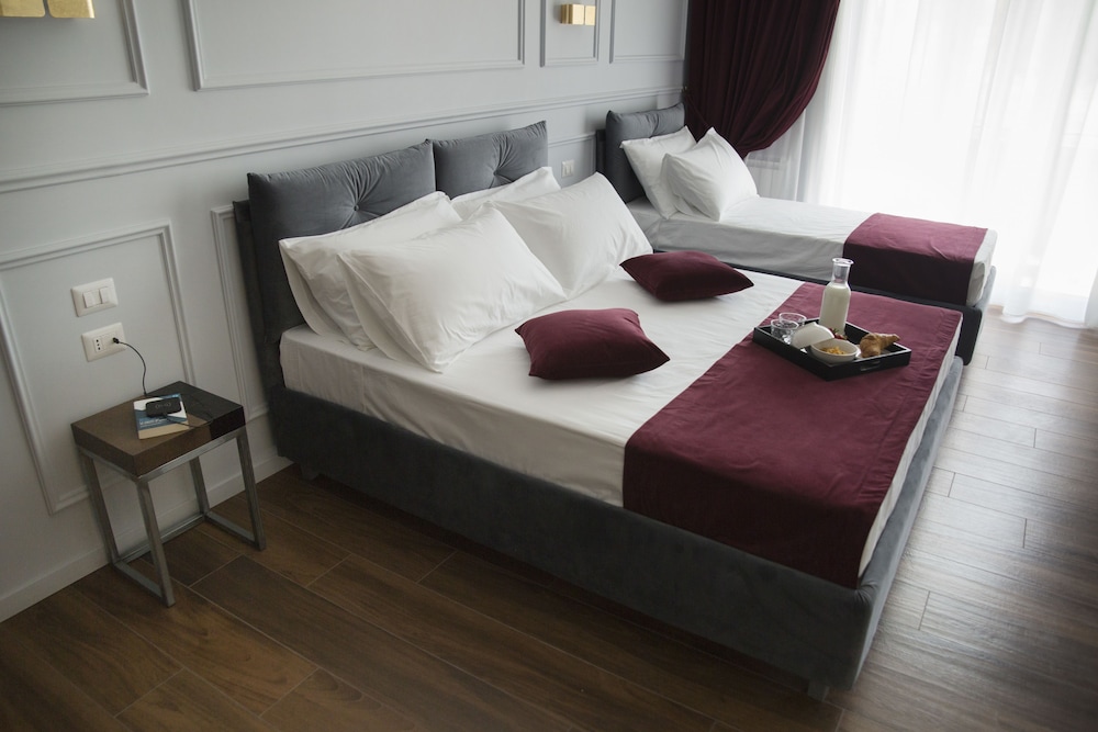 Unicum Roma Suites 7/50