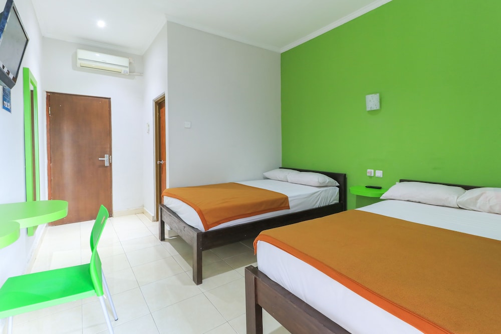 Hotel Warta Putra by ZUZU 13/32