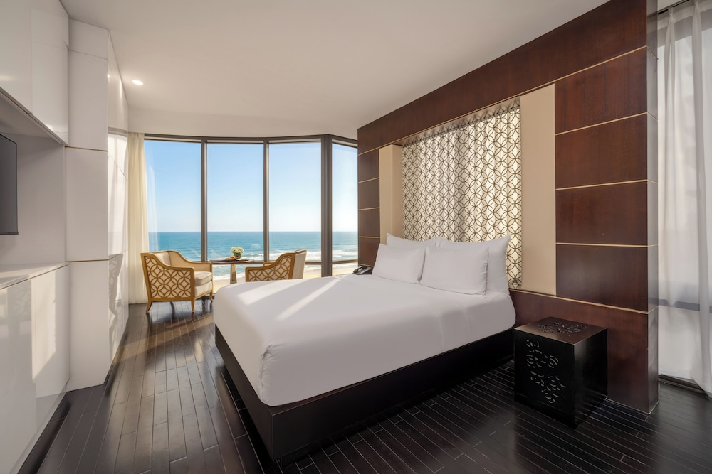 جناح جونيور بسرير مزدوج بإطلالة على البحر بحوض استحمام، Holiday Beach Hotel Danang 6/10