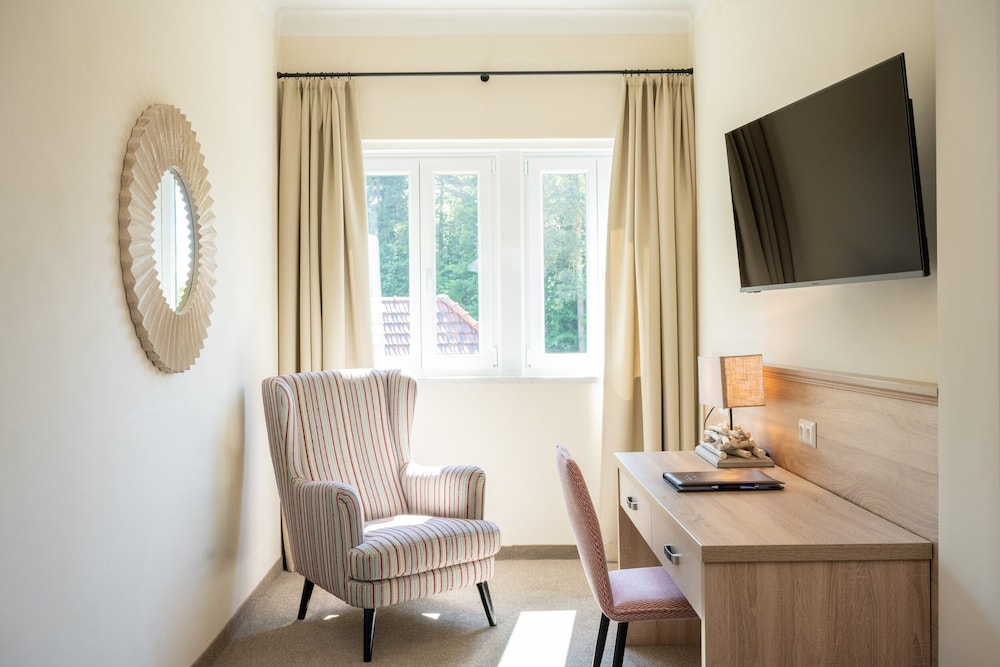 Inselhotel Faakersee 57/63
