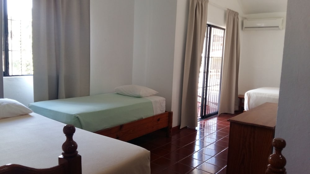 Studio, Suite, 1 Single and 2 Double Beds