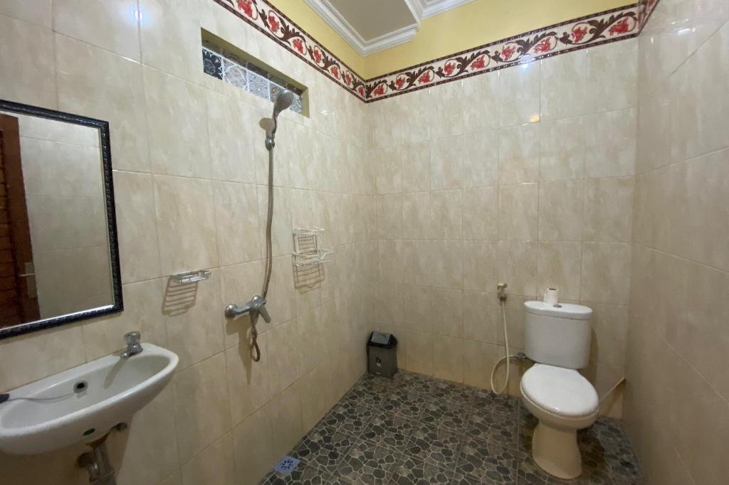 Capital O 93844 Arta Adi Homestay NearBali Zoo 22/24