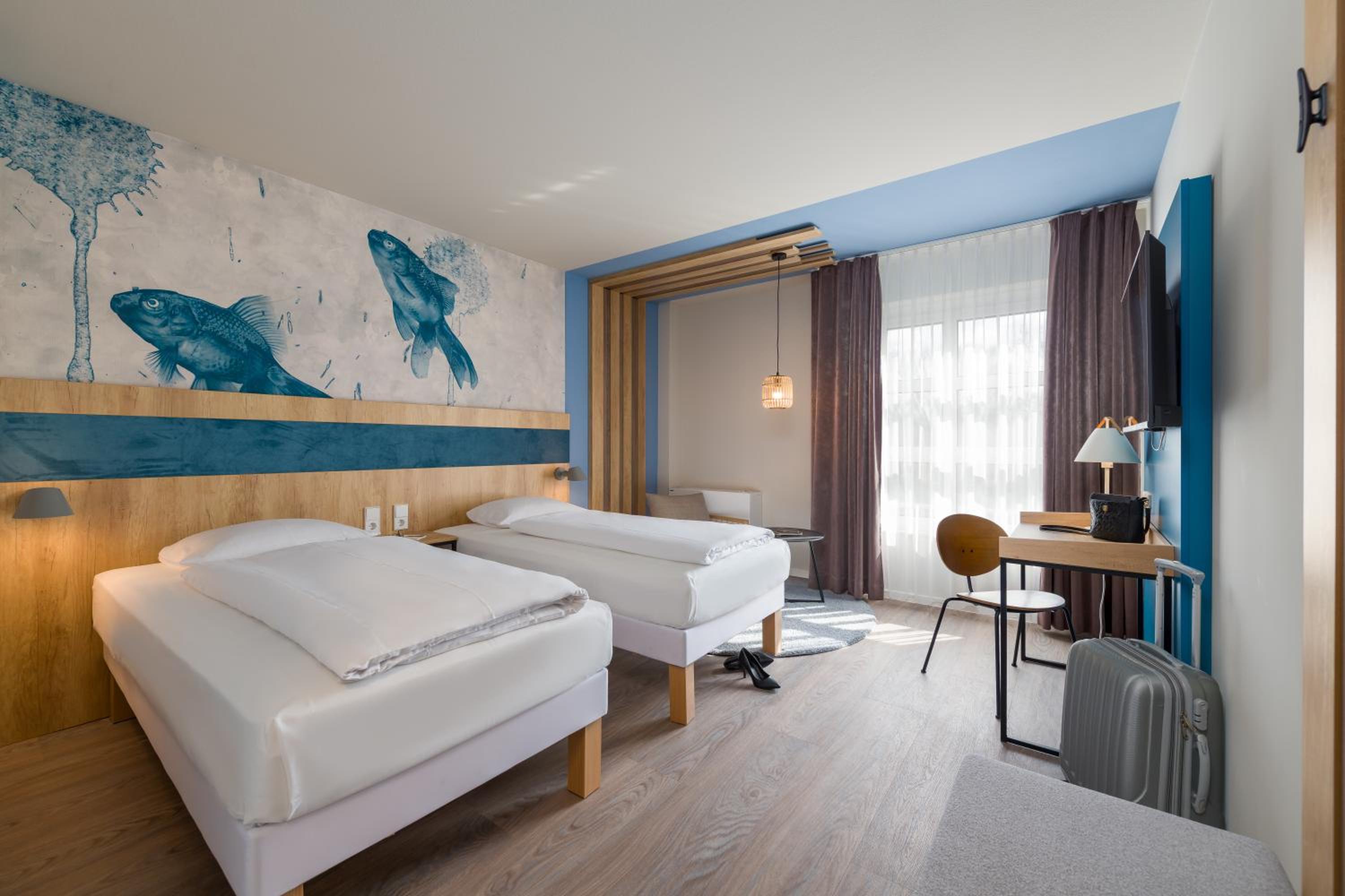 غرفة سوبيريور بسريرين منفصلين بإطلالة على النهر، ibis Styles Regensburg 2/10