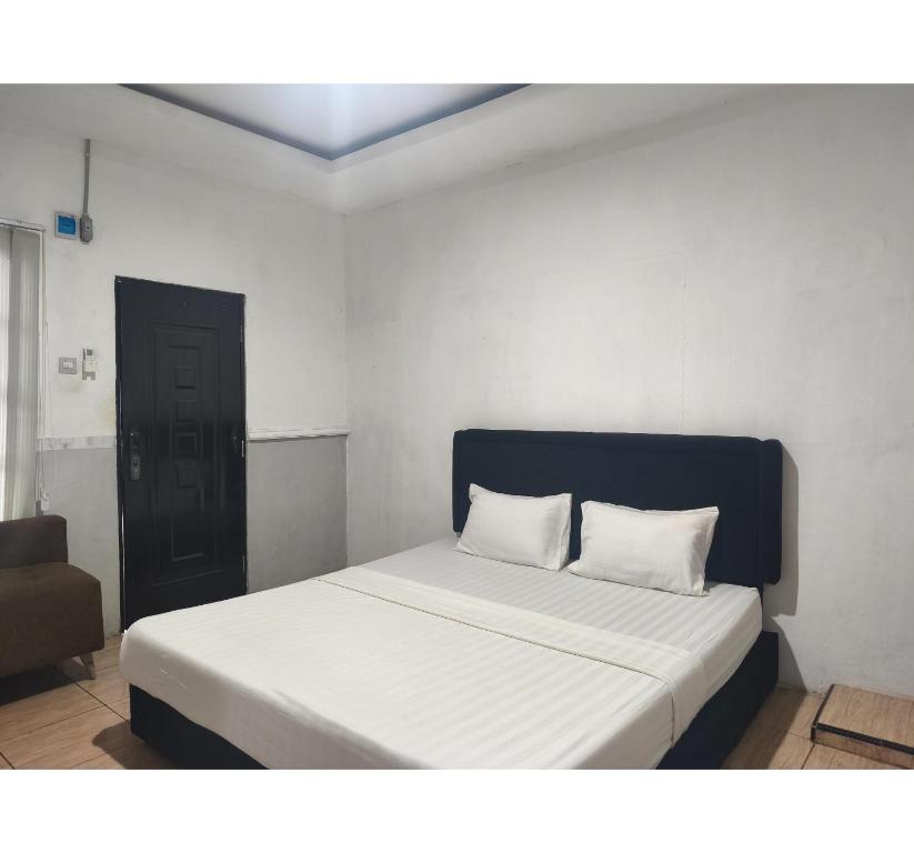 Room at Hotel O near Mall Boemi Kedaton formerly House Of Tuwuh 1, BANDAR LAMPUNG