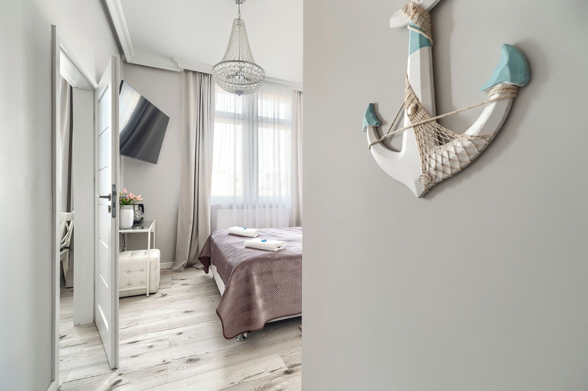 غرفة كومفورت رباعية بسرير كوين وسريرين منفصلين بحمام خاص، Stawa Hostel 7/8