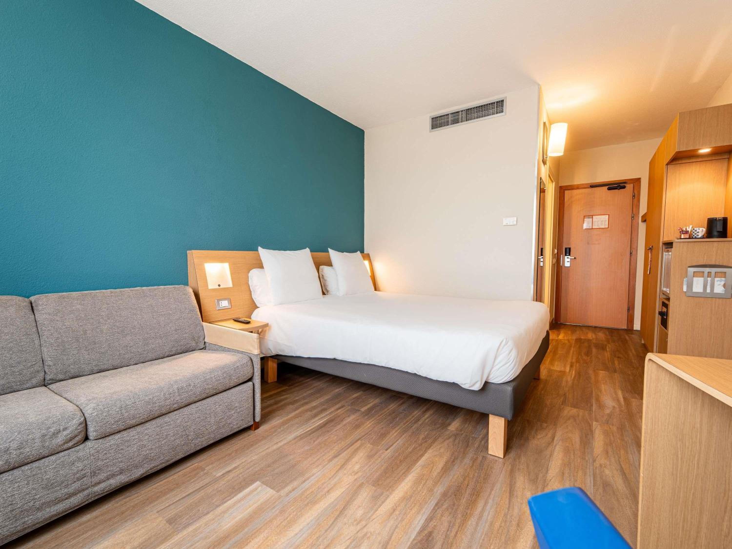 غرفة تنفيذية بسرير كينج مع أريكة، Novotel Roma Est 4/10