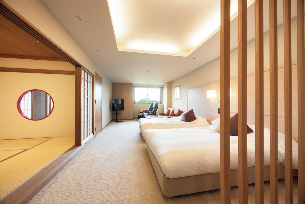 جناح بسريرين مزدوجين وفرشتي فوتون