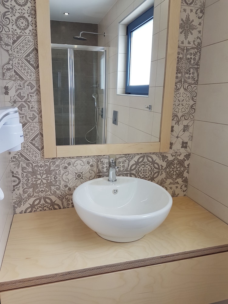 Astra Village & Suites 59/63