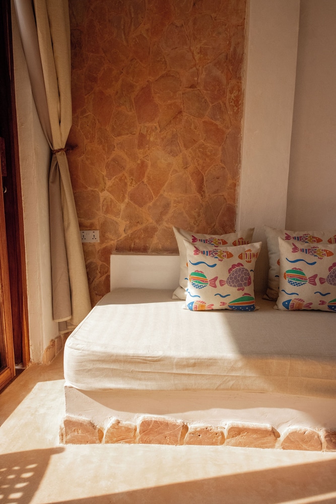 غرفة سيغنتشر ثلاثية بسرير كينج وسرير فردي بإطلالة على البحر، Mvuvi Boutique Resort 3/10