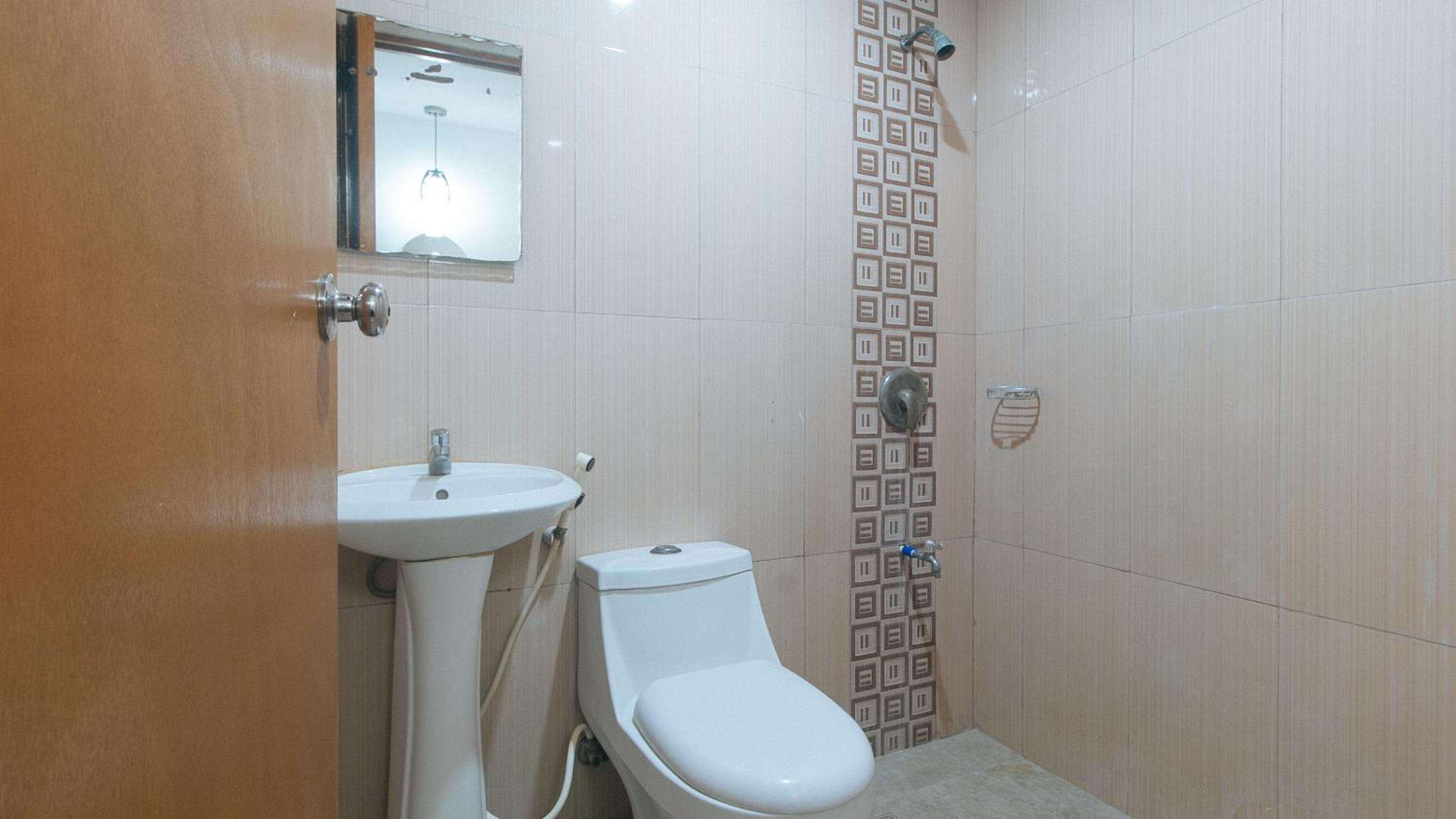 OYO 717 Ranchotel Bayanan 49/50