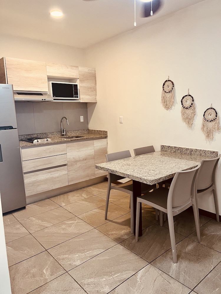 Grand Fifty Suites 55/65
