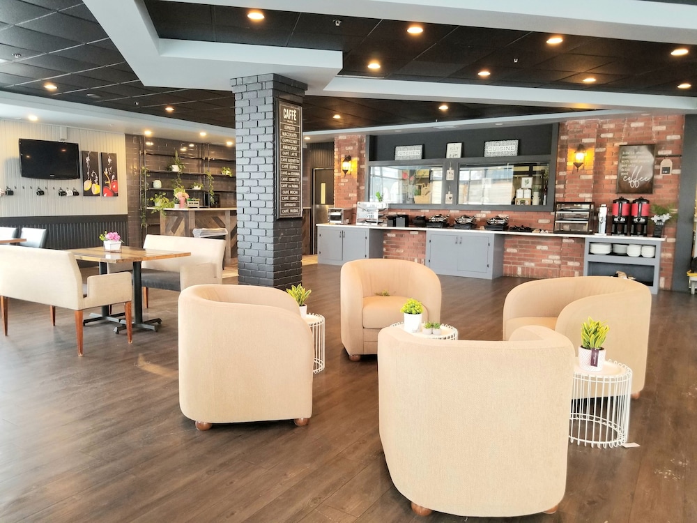 Merit Hotel And Suites 47/66
