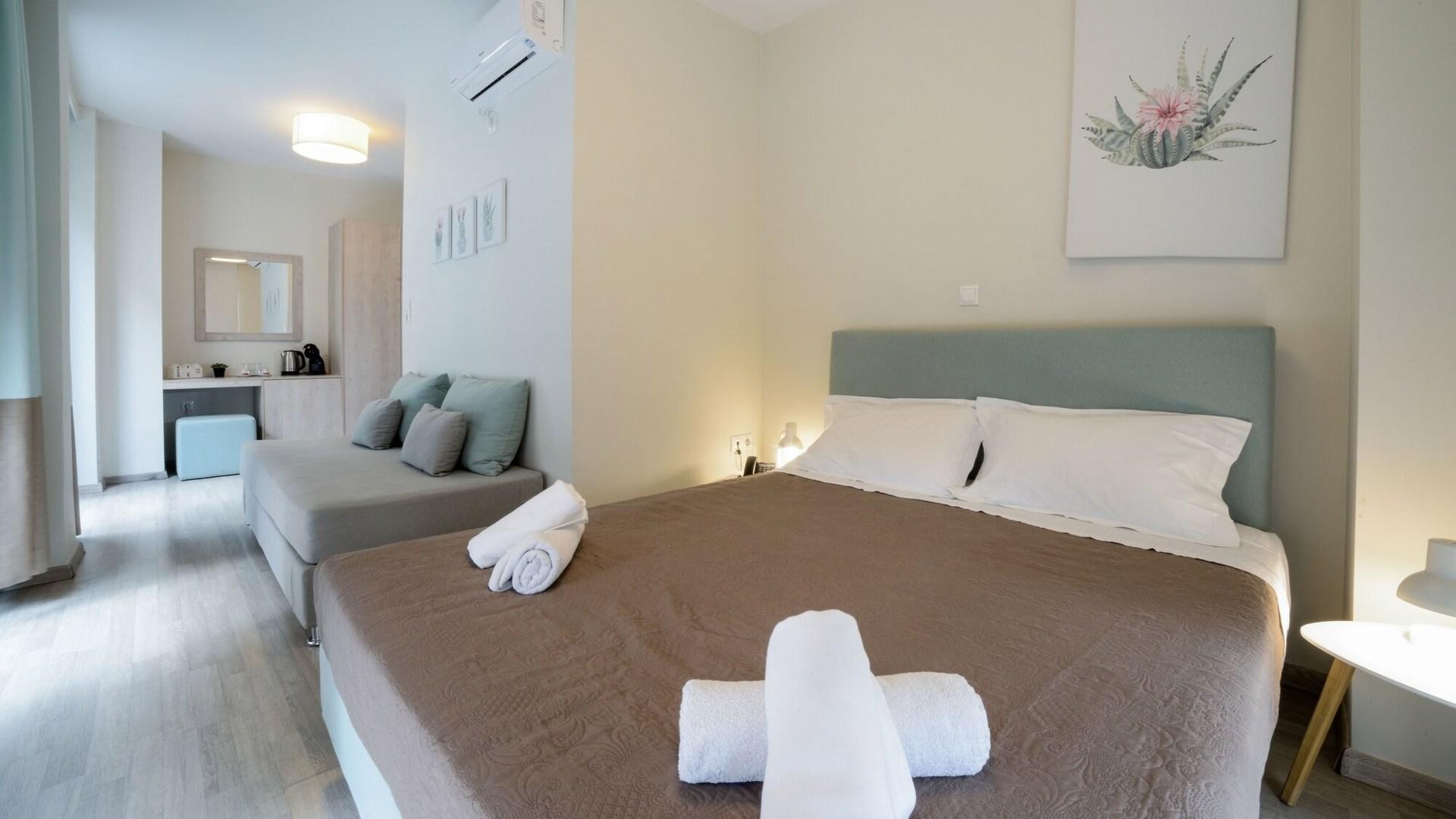 جناح ديلوكس بسرير كوين بإطلالة على المدينة، Tins Hotel City 2/2