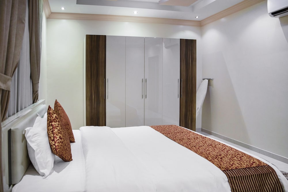 شقة بسرير كينج وسريرين منفصلين بغرفتي نوم، اويو 628 اجنحة وسن(OYO 628 Wasan Suites) 3/7