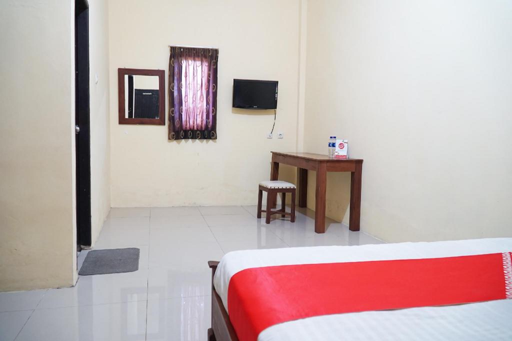 OYO 1034 Pondok Mulia Guest House 20/33